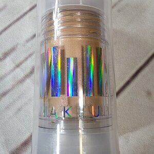 New Milk Makeup trance highlighter glitter stick